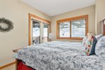 Master Bedroom with King Bed, Full Bath, Balcony Access and Slope Views 